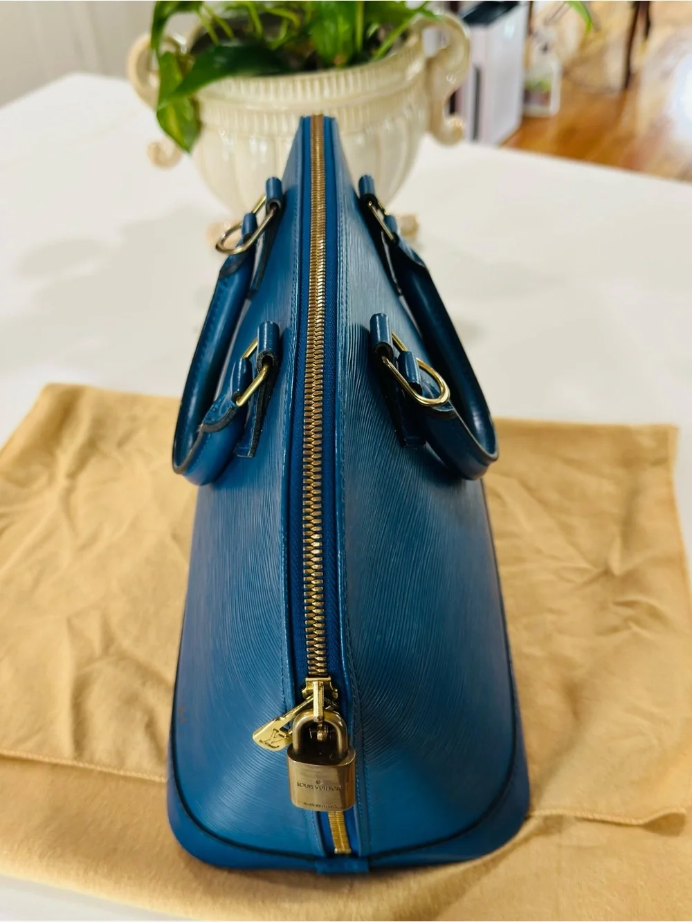Louis Vuitton Blue Epi Alma Satchel with Gold Hardware